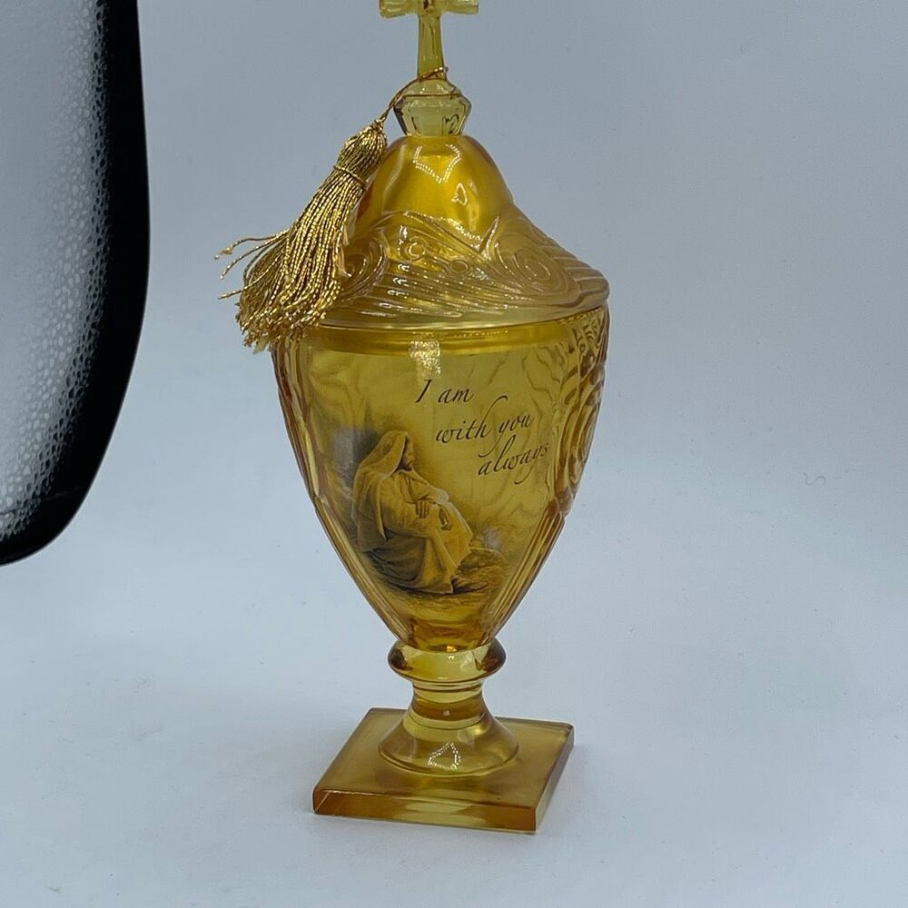 Vintage Amber Glass Religious pedestal goblet with music box lid.